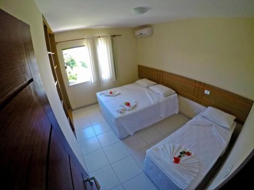 Three-Bedroom Apartment room in Aquaville Apart Hotel