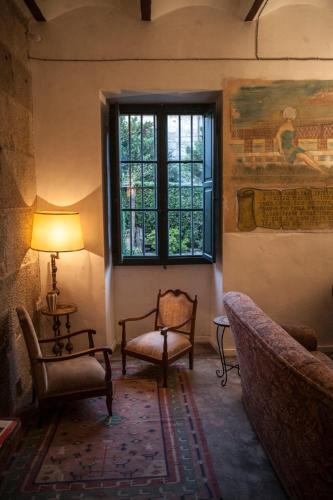 Shared lounge/TV area, Albergue Convento Del Camino in Albelos