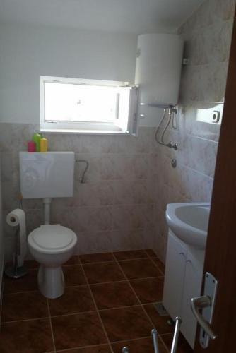 Apartments with a parking space Kolan, Pag - 16482