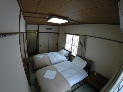 Double or Twin Room with Shared Bathroom