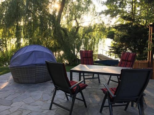 Häuschen direkt am See mit privater Sauna und Boot