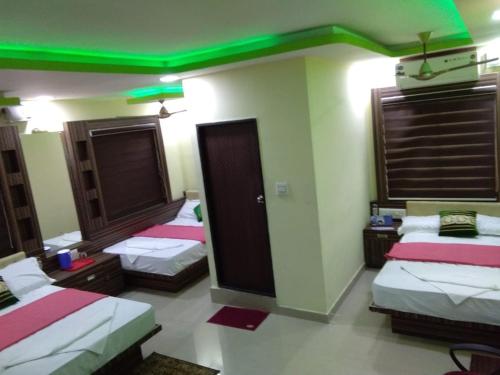 B&B Mangaluru - Highland Inn Hotel - Bed and Breakfast Mangaluru