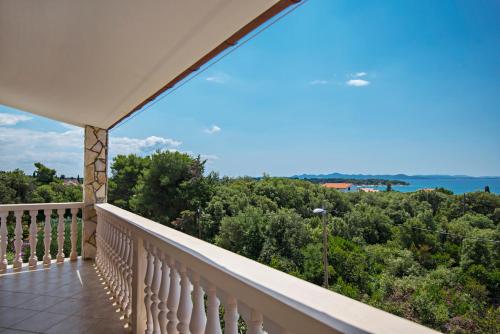 Two-Bedroom Apartment with Balcony and Sea View