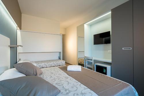 Quadruple Room with Garden View room in Hotel Relax Family & Spa