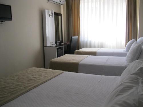 Chambre triple, 3 lits