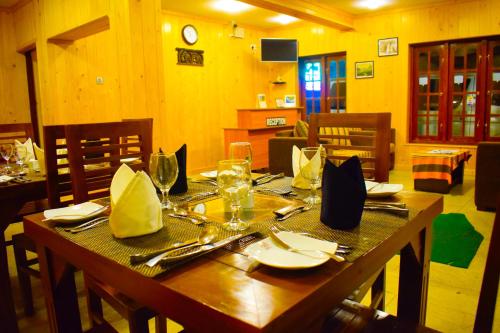 Közös társalgó / TV, Blue Moon Hotel in Pundaluoya