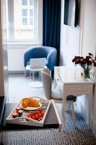 Amber Design Residence Amber Design Residence is perfectly located for both business and leisure guests in Krakow. The property offers a wide range of amenities and perks to ensure you have a great time. Daily housekeeping,