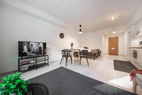 Shared lounge/TV area, Spot Apartments Espoo Center in Espoo
