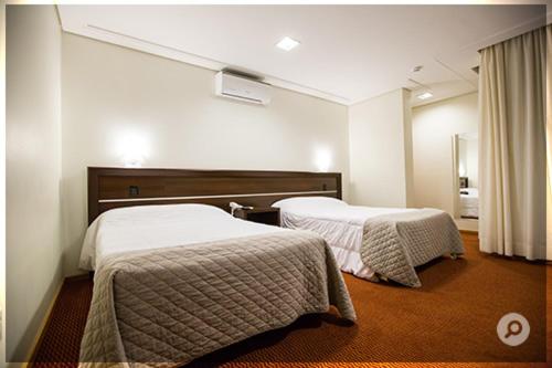 Mogano Premium Mogano Premium is conveniently located in the popular Chapeco area. Featuring a complete list of amenities, guests will find their stay at the property a comfortable one. 24-hour front desk, facilitie