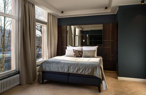 Spinoza Suites – Amsterdam, NY