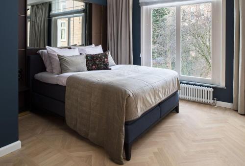 Spinoza Suites – Amsterdam, NY