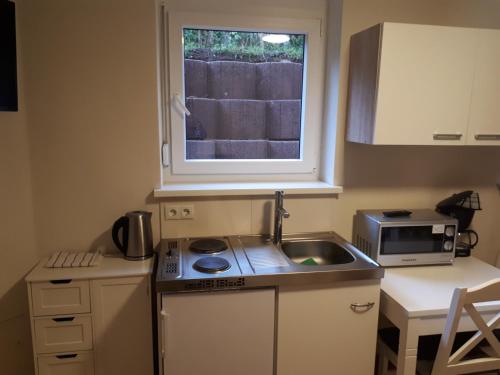 廚房, Fiore Gästezimmer (Fiore Gastezimmer) in 埃塞爾巴赫