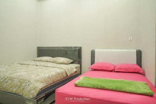 Family Room with Bathroom room in M Stay Guest House Jogja