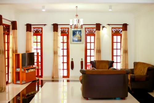 gedeelde lounge/tv-ruimte, Montana Rest Apartments in Anuradhapura