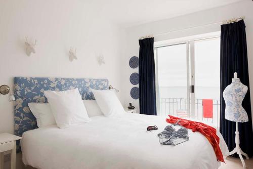 斯特蘭德酒店 (The Strand Inn) in 鄧莫爾東