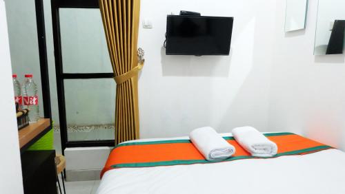 Hotel Kili Suci By Simply Homy The 3-star Hotel Kili Suci offers comfort and convenience whether youre on business or holiday in Yogyakarta. The property features a wide range of facilities to make your stay a pleasant experience.