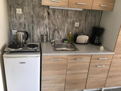 Kitchen, Joges Apartment in Kavala