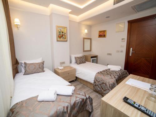 Standard Triple Room room in HHK Hotel Downtown