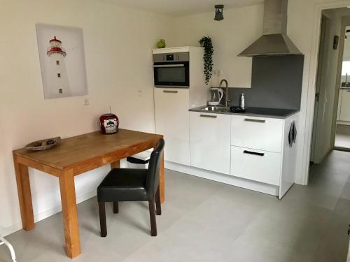 Kitchen, Ferienhaus Glucklich am Meer 3 mit Wellnesszugang in Egmond aan Zee
