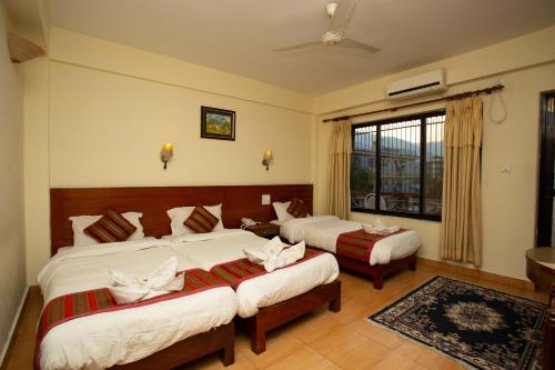 Deluxe Triple Room with Balcony