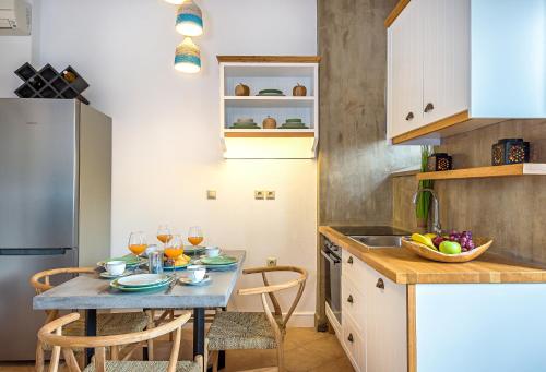 Lithinon Luxury Suites - Tap to explore photos