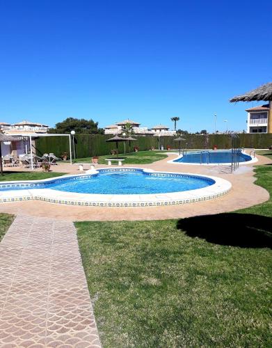 Fabulous detached large villa 5 bedrooms 3 bathrooms backing onto Villamartin Golf Course