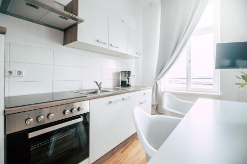 Luga Homes - Stadthaus 144m von Kurt-Schumacher-Straße entfernt