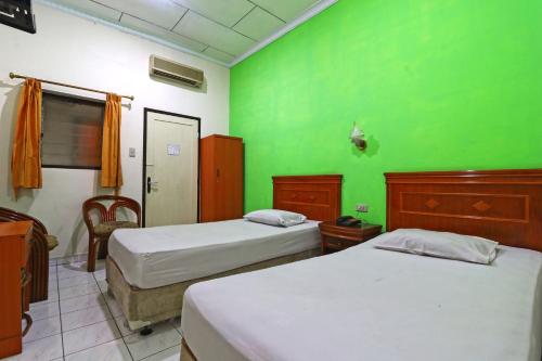 Hotel Sumatera - Tap to explore photos