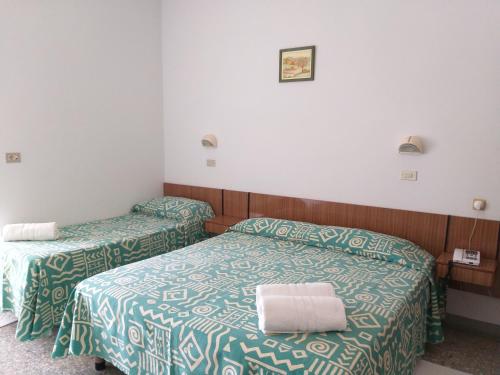 Hotel Alfa - SPIAGGIA INCLUSA con Formula All Inclusive 7 notti - Tap to explore photos