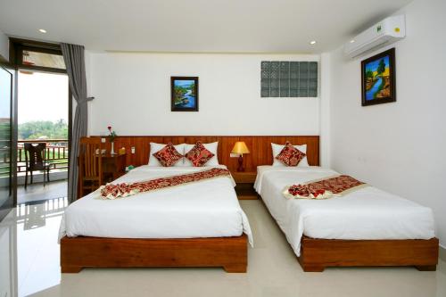 Threeway Riverside Villa, Hoi An (fotografie 9)