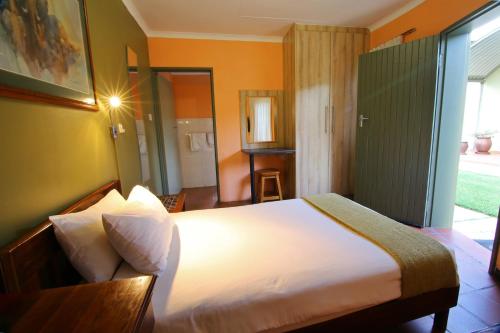 Kalahari Arms Hotel Kalahari Arms Hotel is perfectly located for both business and leisure guests in Default city. Featuring a satisfying list of amenities, guests will find their stay at the property a comfortable one. 