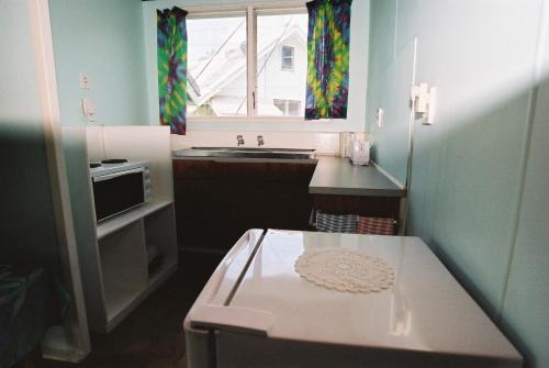 Küche, Gina's Garden Lodges in Aitutaki