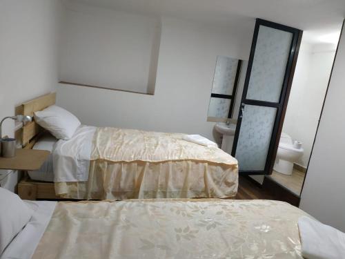 Twin Room with Private Bathroom room in Casa de Anais y Nicolas