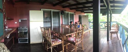 Közös társalgó / TV, Treetops Boutique Hotel & Bungalow's in Pango Beach