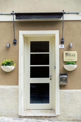 Rigel Villanova Rooms - Tap to explore photos