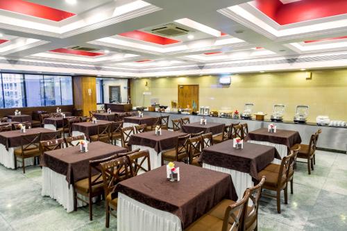 مطعم, فندق تيب توب بلازا (Hotel Tip Top Plaza) in ثين
