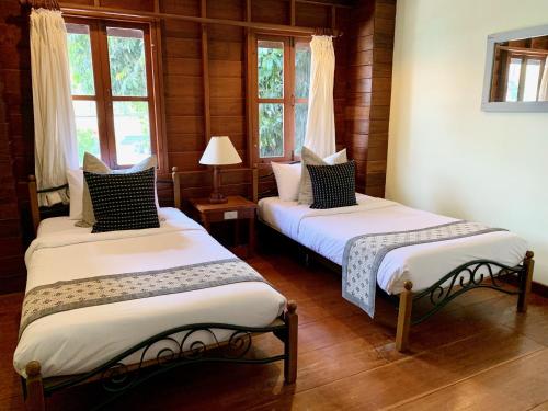Riverhouse Hotel - The Teak House Room Type - Standard Twin Room with City View Riverhouse Hotel - The Teak House Room Type - Standard Twin Room with City View
