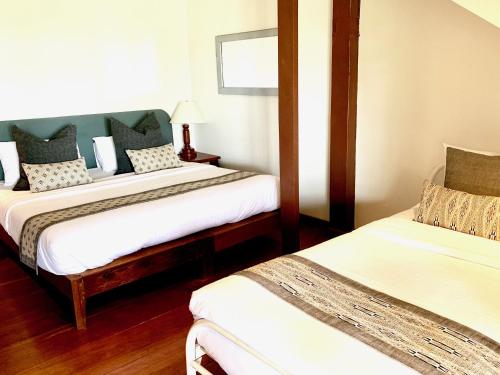 Riverhouse Hotel - The Teak House - Tap to explore photos