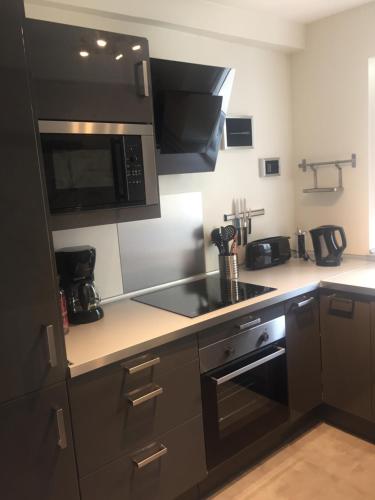 ห้องครัว, Gite le Petit Puits à Richelieu (Gite le Petit Puits a Richelieu) in รีเชอลีเยอ