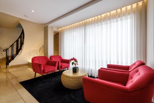 ห้องส่วนกลางสำหรับนั่งเล่น/ดูทีวี, Hotel Regina in ฟาติมา