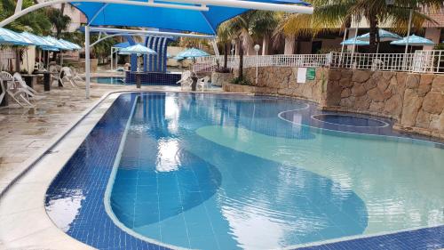 Swimming pool, Apartamento Caldas in Popular