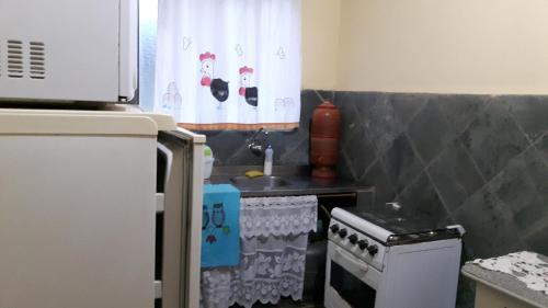 Casa dois andares com área de churrasco em Ibitipoca