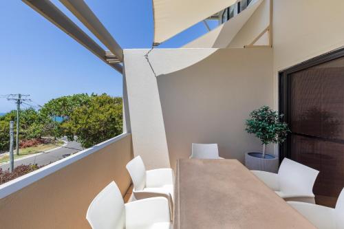 Wake up to ocean views in stylish comfort - image 5