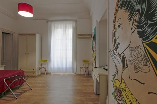 Deluxe Quadruple Room with Balcony image 3