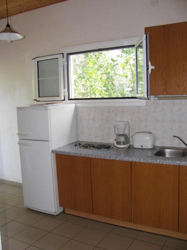 NIKOS, Kakóvatos (photo 4)