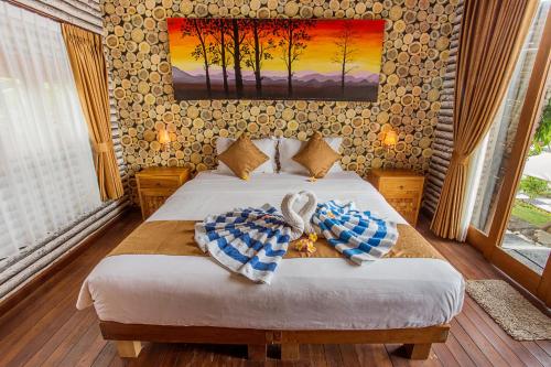 Deluxe Double Room (2 Adults + 1 Child) room in Kabeh Jati Garden Villa & Restaurant