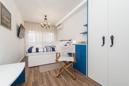 Blue Old Navy Rooms by Adex travel - Tap to explore photos
