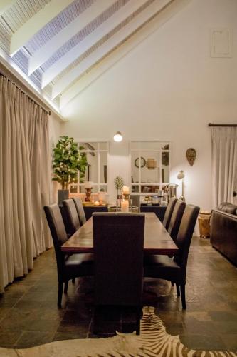 Shared lounge/TV area, African Safari Lodge in Thomas Baines Nature Reserve