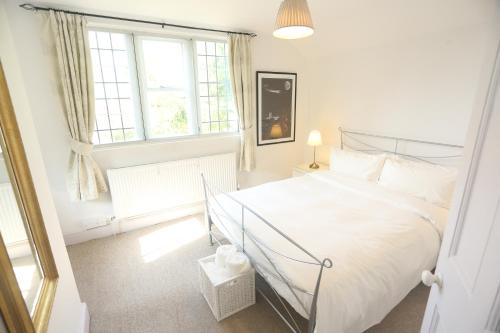 Entire Victorian Lodge in a privately gated estate with secure parking for two cars and a newly refu