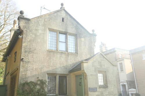 Entire Victorian Lodge in a privately gated estate with secure parking for two cars and a newly refu in Combe Down